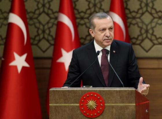 Turkish President Erdogan makes a speech during his meeting with mukhtars at the Presidential Palace in Ankara